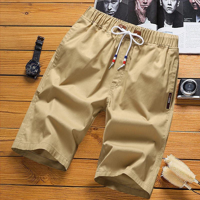 6XL hvítir stuttbuxur karlar sumar bómull hné lengd stuttbuxur Bermudas kóreska tískan teygjanlegt mitti