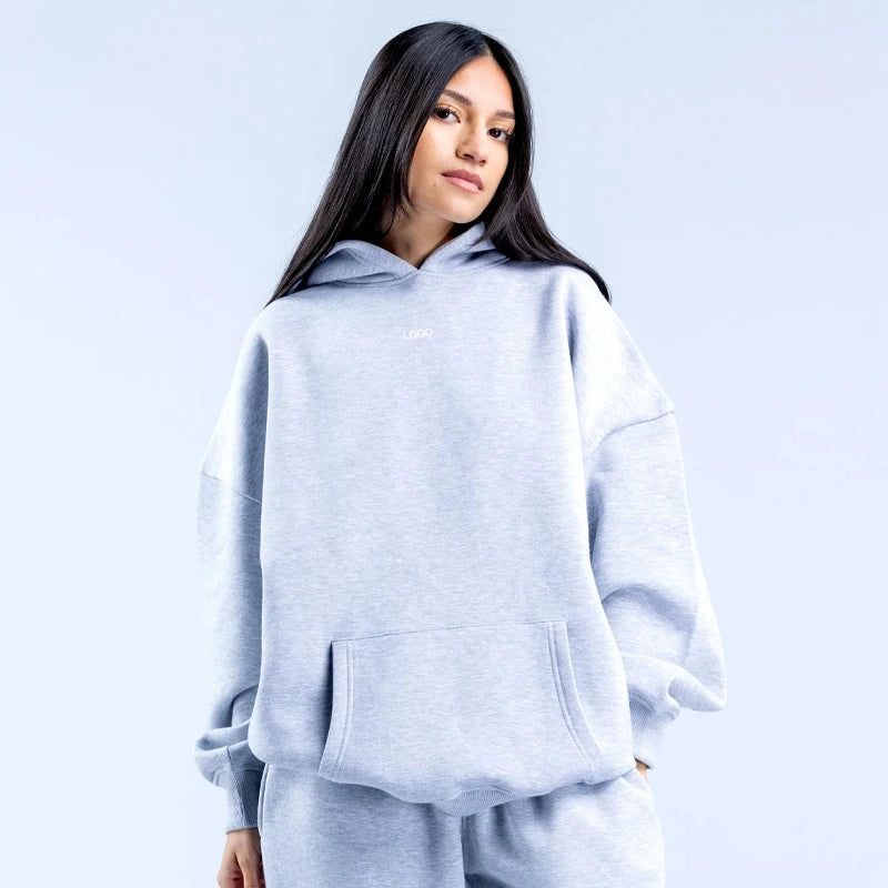 Nya kvinnors avslappnade modetryck kostym fast färg förtjockad varm huva topp elastiska sportbyxor kvinnliga yoga hoodie