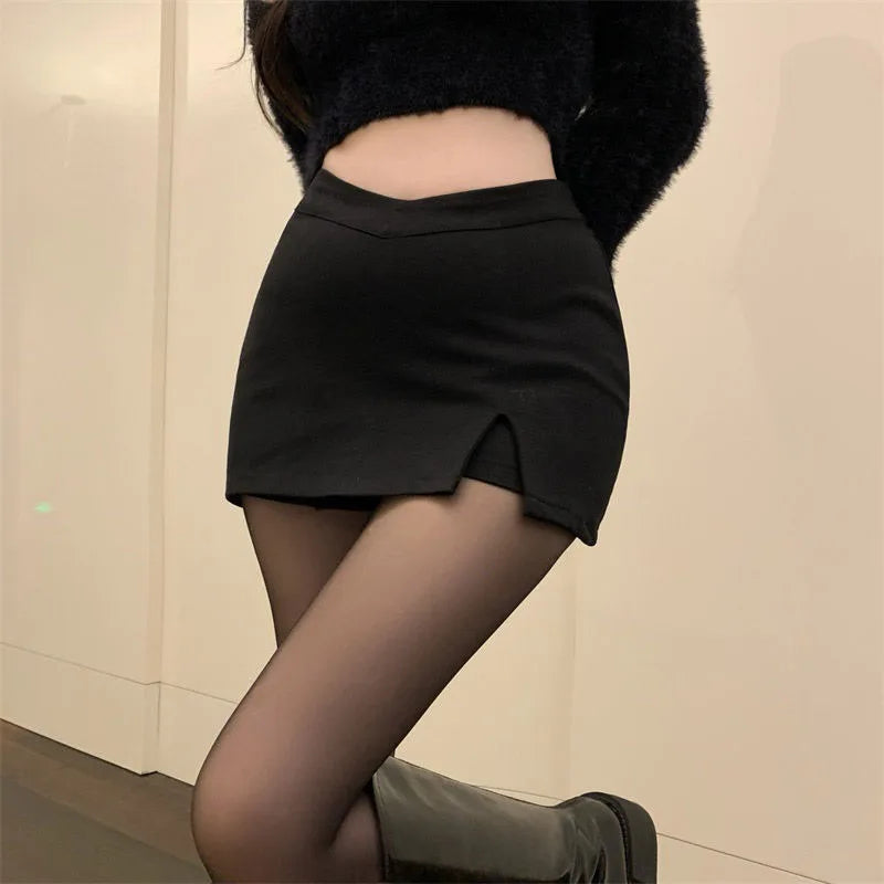 Black Split Mini kjolar kvinnor sommar sexig klubb hög midja slits kjol streetwear koreansk fest mode oregelbundna smala en linjekjol