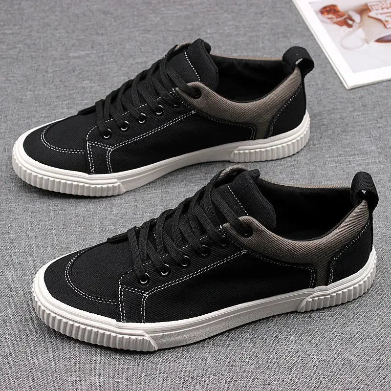 Men's Spring Canvas Shoes New Breathable Lace Up Casual Men's Versatile Flat Bottomed Cloth Shoes Anti Skateboard Shoes Tenis