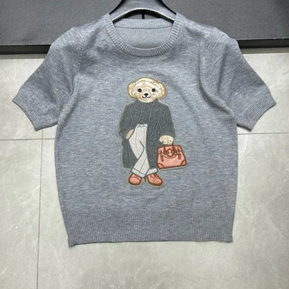 Eurooppalainen tyylinen luksusbrändi löysä O-kaula-aukkoa Pullover Tops Neule Woman Lyhythihainen T-paita Ladies Wooleulottu villapaita