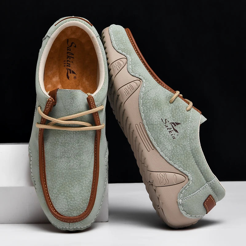 Nuove 2024 Scarpe da uomo casual in pelle fatte a mano in pelle Sneaker man per le scarpe da top bassa traspirabili con le scarpe piazzate con una taglia più dimensioni