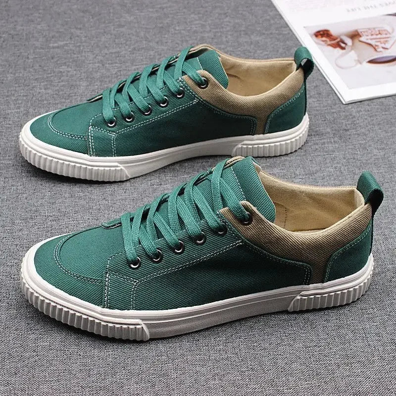 Men's Spring Canvas Shoes New Breathable Lace Up Casual Men's Versatile Flat Bottomed Cloth Shoes Anti Skateboard Shoes Tenis