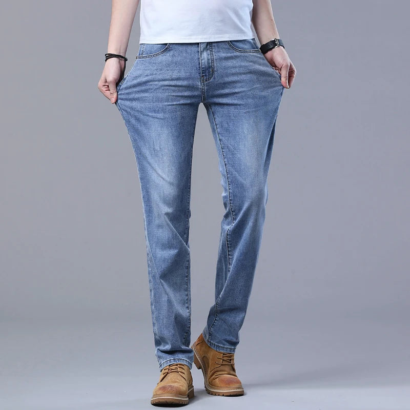 Vårens lyseblå slanke jeans Stilig casual strekkstoff denimbukser klassiske bukser røyker grå