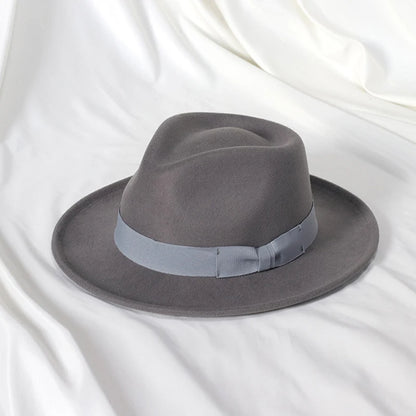 2022 Nya mode män fedoras hatt kvinnors jazzhatt med fluga elegant vår svart ullblandning mössa utomhus fellans hatt