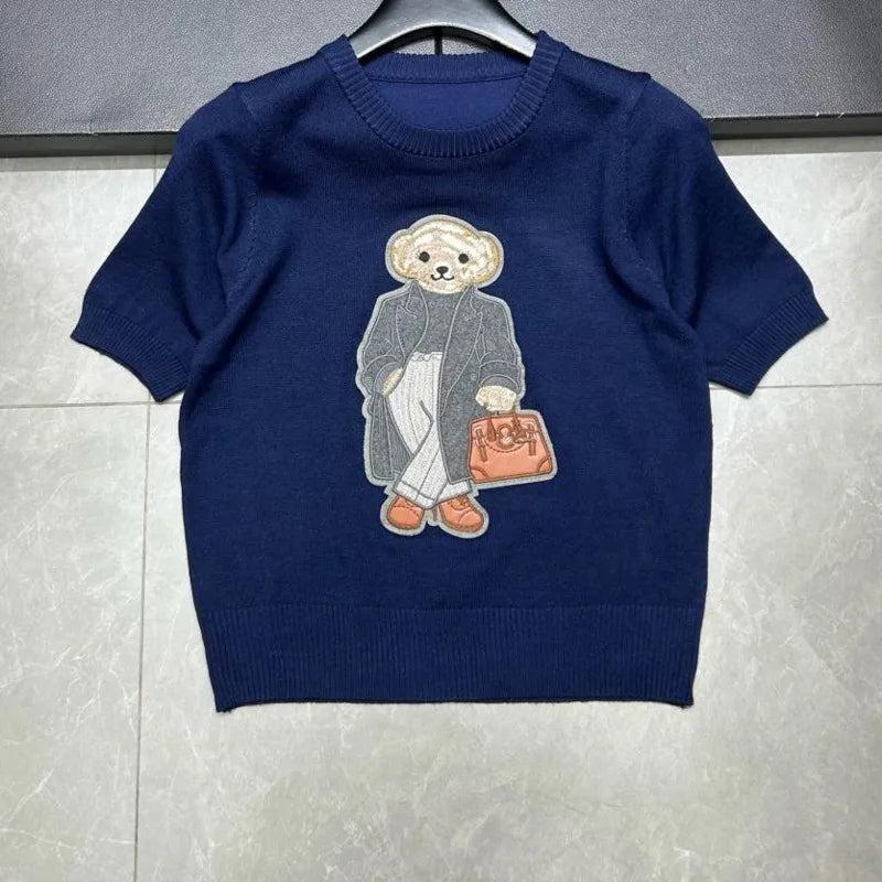 Eurooppalainen tyylinen luksusbrändi löysä O-kaula-aukkoa Pullover Tops Neule Woman Lyhythihainen T-paita Ladies Wooleulottu villapaita