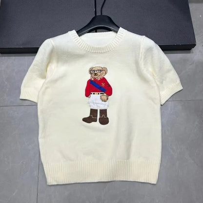 Eurooppalainen tyylinen luksusbrändi löysä O-kaula-aukkoa Pullover Tops Neule Woman Lyhythihainen T-paita Ladies Wooleulottu villapaita