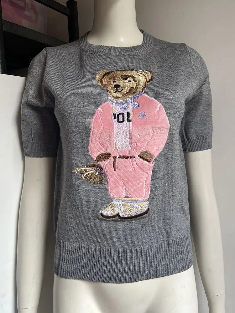 Eurooppalainen tyylinen luksusbrändi löysä O-kaula-aukkoa Pullover Tops Neule Woman Lyhythihainen T-paita Ladies Wooleulottu villapaita