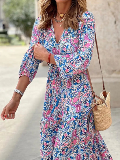 Frauen Herbst neue modische gedruckte sexy V-Ausschnitt Langhülse hohe Taille elastische Taille mittlere Länge Bohemian Kleid