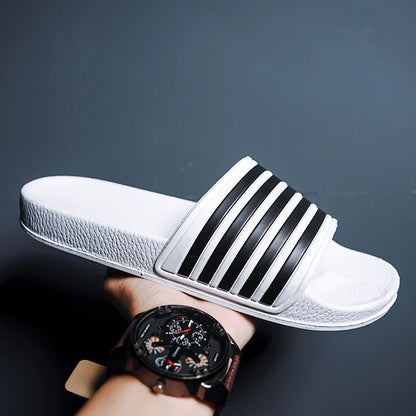 2025 Mens Slippers Mulheres deslizam casais de verão Sapato de praia Pontas macias Mulas de deslizamento Men Slippers Colo Casual Tamanho Big Size 37-48
