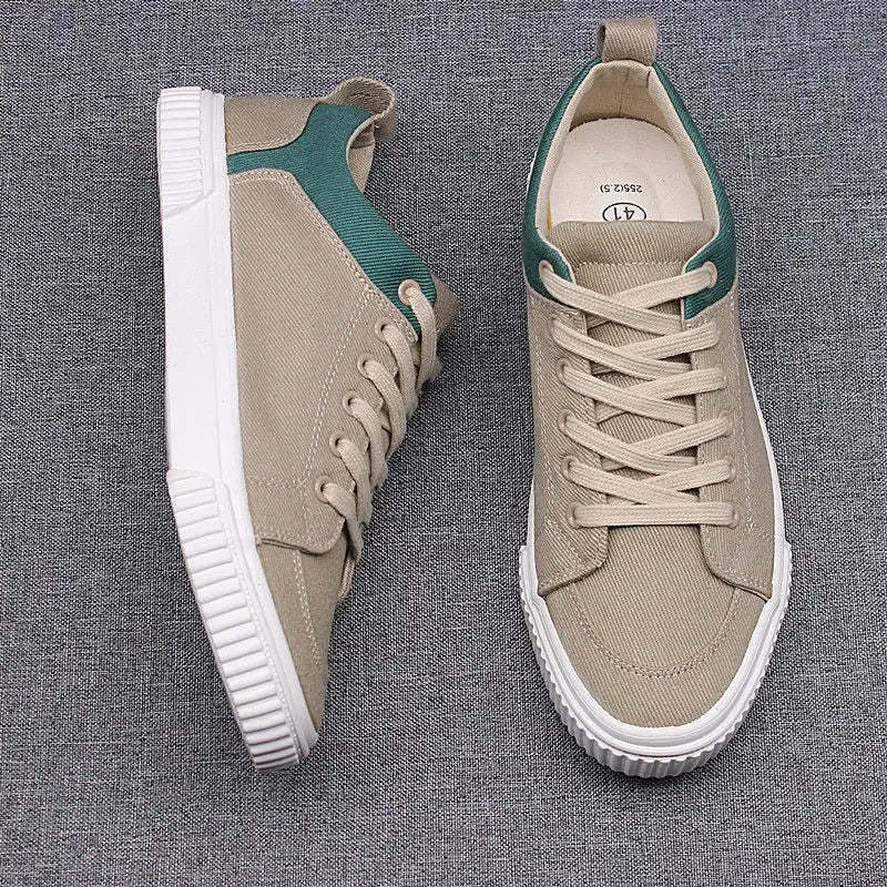 Men's Spring Canvas Shoes New Breathable Lace Up Casual Men's Versatile Flat Bottomed Cloth Shoes Anti Skateboard Shoes Tenis