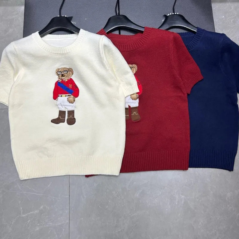 Eurooppalainen tyylinen luksusbrändi löysä O-kaula-aukkoa Pullover Tops Neule Woman Lyhythihainen T-paita Ladies Wooleulottu villapaita