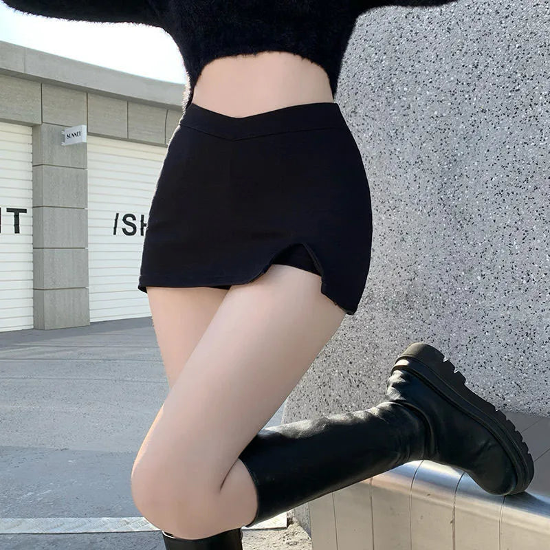 Black Split Mini kjolar kvinnor sommar sexig klubb hög midja slits kjol streetwear koreansk fest mode oregelbundna smala en linjekjol