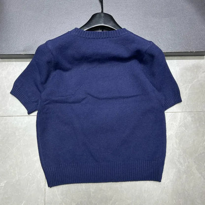 Eurooppalainen tyylinen luksusbrändi löysä O-kaula-aukkoa Pullover Tops Neule Woman Lyhythihainen T-paita Ladies Wooleulottu villapaita