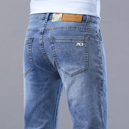 Vårens lyseblå slanke jeans Stilig casual strekkstoff denimbukser klassiske bukser røyker grå